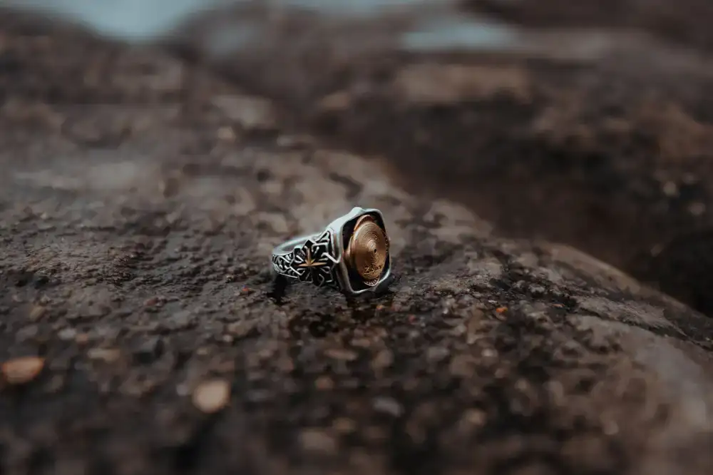 A finished bespoke silver ring with a unique textured band